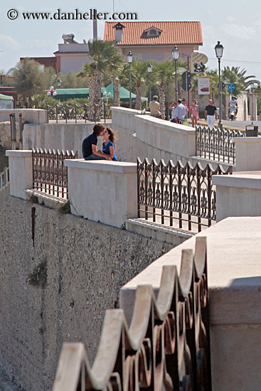 teenage-couple-on-seaside-wall-3.jpg