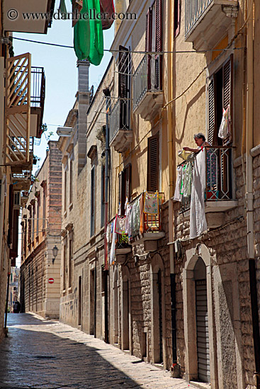 laundry-hanging-from-balcony-w-woman-3.jpg