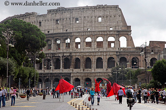 red-stilt-people-at-colosseum-1.jpg