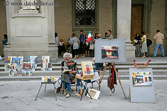 artist-w-paintings.jpg