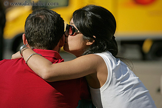 woman-kissing-ear-1.jpg