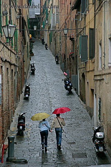 couple-walking-w-umbrella-1.jpg