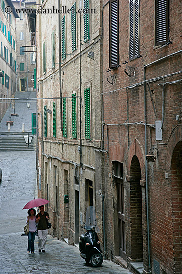 couple-walking-w-umbrella-2.jpg