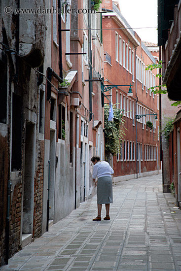 woman-sweeping-street.jpg