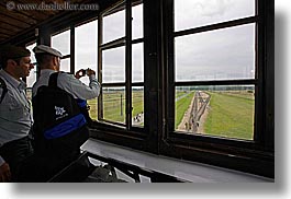 images/Europe/Poland/Auschwitz/men-viewing-from-guard-tower.jpg