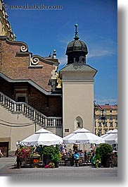 images/Europe/Poland/Krakow/Buildings/onion-dome-n-restaurant-umbrellas.jpg