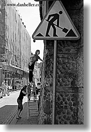 images/Europe/Poland/Krakow/People/Women/women-on-ladder-bw.jpg