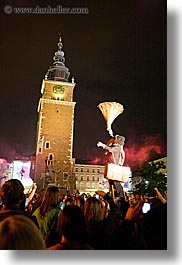 images/Europe/Poland/Krakow/Performance/clock_tower-n-man-with-cone-1.jpg