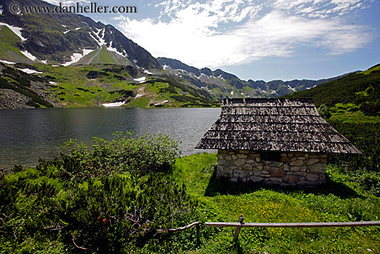 hut-by-lake-w-mtns-1.jpg