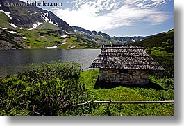 images/Europe/Poland/Landscapes/hut-by-lake-w-mtns-1.jpg