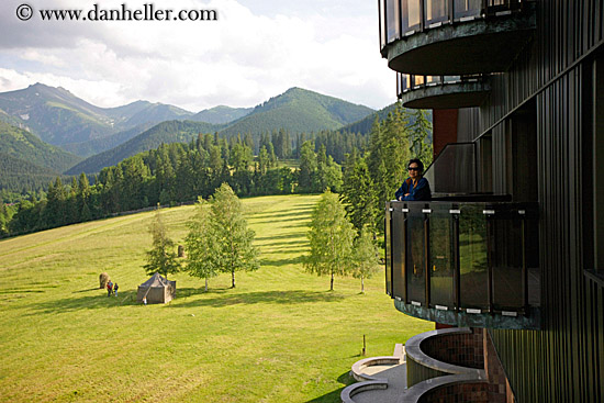 woman-on-balcony-w-mtn-scenic.jpg