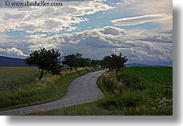 images/Europe/Slovakia/Roads/tree-lined-winding-road-n-clouds-2.jpg