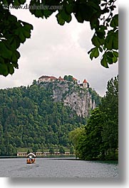 bled, boats, castles, europe, lakes, rowing, slovenia, vertical, photograph