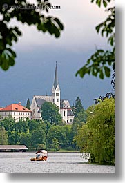 bled, boats, churches, europe, lakes, rowing, slovenia, vertical, photograph