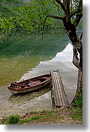 boats, bohinj, branches, europe, lakes, piers, slovenia, trees, vertical, water, photograph