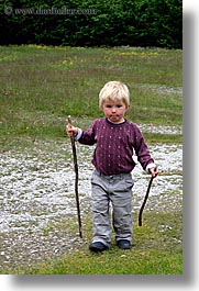 images/Europe/Slovenia/Bohinj/People/little-boy-walking-sticks-2.jpg
