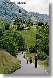 churches, dreznica, europe, hikers, hiking, paths, paved, people, slovenia, vertical, photograph