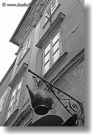 arts, black and white, buildings, europe, hangings, irons, ljubljana, slovenia, teapots, vertical, windows, photograph