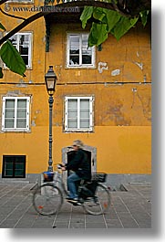 bicycles, cyclists, europe, lamp posts, ljubljana, slovenia, towns, vertical, windows, photograph