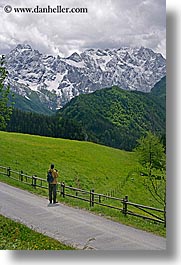 europe, hikers, hiking, logarska dolina, mountains, photographers, roads, slovenia, snowcaps, vertical, photograph