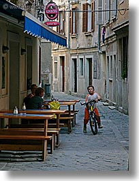 bicycles, boys, childrens, cobblestones, europe, people, pirano, slovenia, vertical, photograph