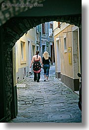 archways, cobblestones, europe, girls, people, pirano, slovenia, teenage, teenagers, vertical, photograph
