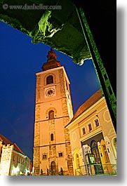 bell towers, buildings, europe, long exposure, nite, ptuj, slovenia, statues, towns, vertical, photograph