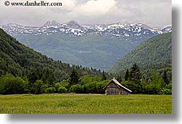 barn, europe, fields, horizontal, mountains, slovenia, snowcaps, triglavski narodni park, photograph