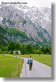 clark, europe, groups, hikers, hiking, james, men, mountains, patty, slovenia, snowcaps, vertical, walking, photograph