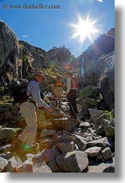 images/Europe/Spain/AiguestortesHike1/hikers-on-rocks-w-sun.jpg
