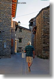 images/Europe/Spain/Estamariu/man-walking-in-street-01.jpg