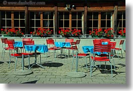 images/Europe/Switzerland/Kandersteg/LakeOeschinensee/red-chairs-blue-tables.jpg