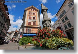 images/Europe/Switzerland/Lucerne/Town/fountain-n-flowers-n-bldg-02.jpg