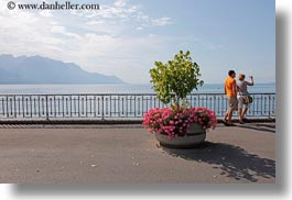 images/Europe/Switzerland/Montreaux/Misc/couple-w-camera-by-lake-n-flowers.jpg