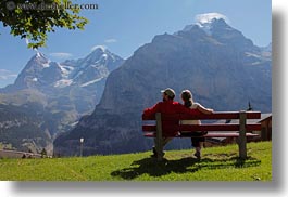 images/Europe/Switzerland/Murren/Hikers/couple-on-bench-by-mtn.jpg