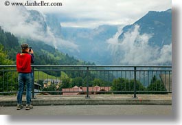 images/Europe/Switzerland/Wengen/woman-photographing-valley.jpg