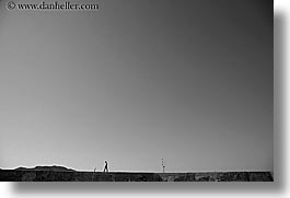 black and white, europe, horizontal, kas, men, silhouettes, turkeys, walking, walls, photograph