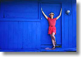 images/LatinAmerica/CostaRica/Misc/red-woman-blue-house.jpg