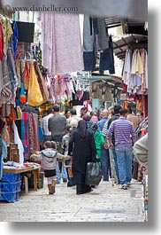 images/MiddleEast/Israel/Jerusalem/Merchandise/muslim-pedestrians-n-hanging-clothes.jpg