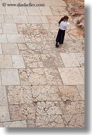 images/MiddleEast/Israel/Jerusalem/People/girl-on-stone-tile.jpg