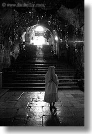 images/MiddleEast/Israel/Jerusalem/ReligiousSites/MarysTomb/nun-walking-up-stairs-2-bw.jpg