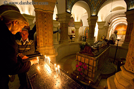 woman-lighting-candles-n-sleeping-mary.jpg