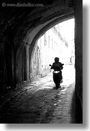 images/MiddleEast/Israel/Jerusalem/Streets/motorcycle-thru-tunnel-bw.jpg
