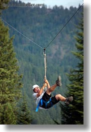 images/UnitedStates/Idaho/RedHorseMountainRanch/Activities/ZipLine/man-swinging-from-zipline-2.jpg