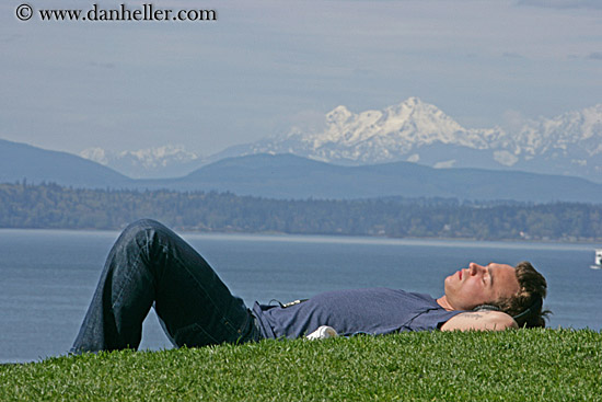 man-sleeping-on-grass.jpg