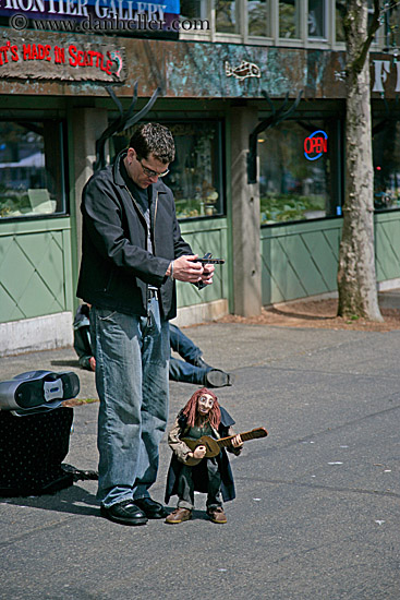 man-w-witch-puppet-guitar.jpg